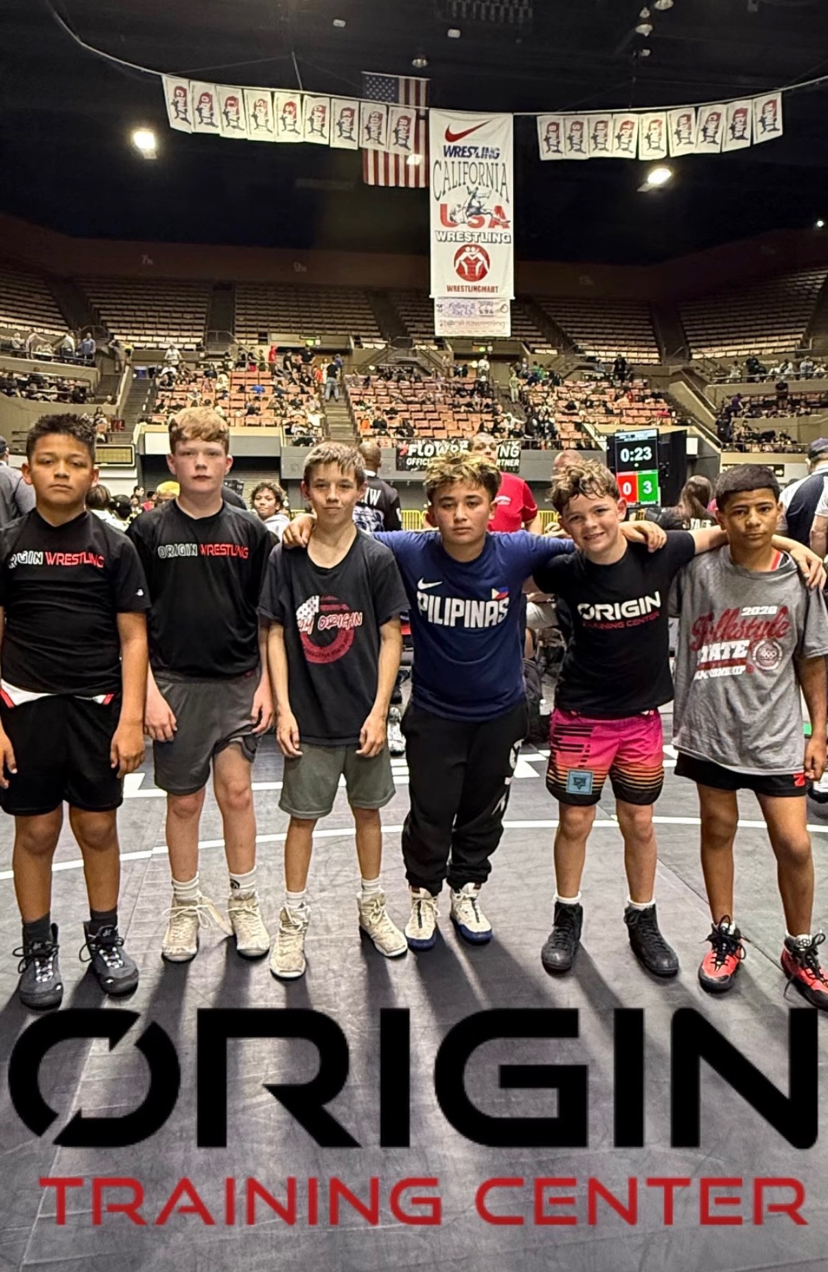 ORIGIN wrestlers at a tournament